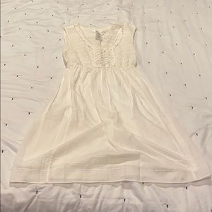 White cotton sundress with smocking bodice